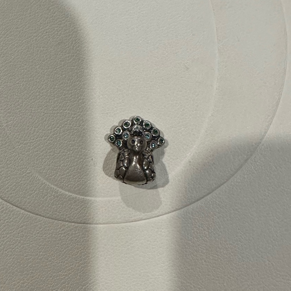 Pandora peacock charm